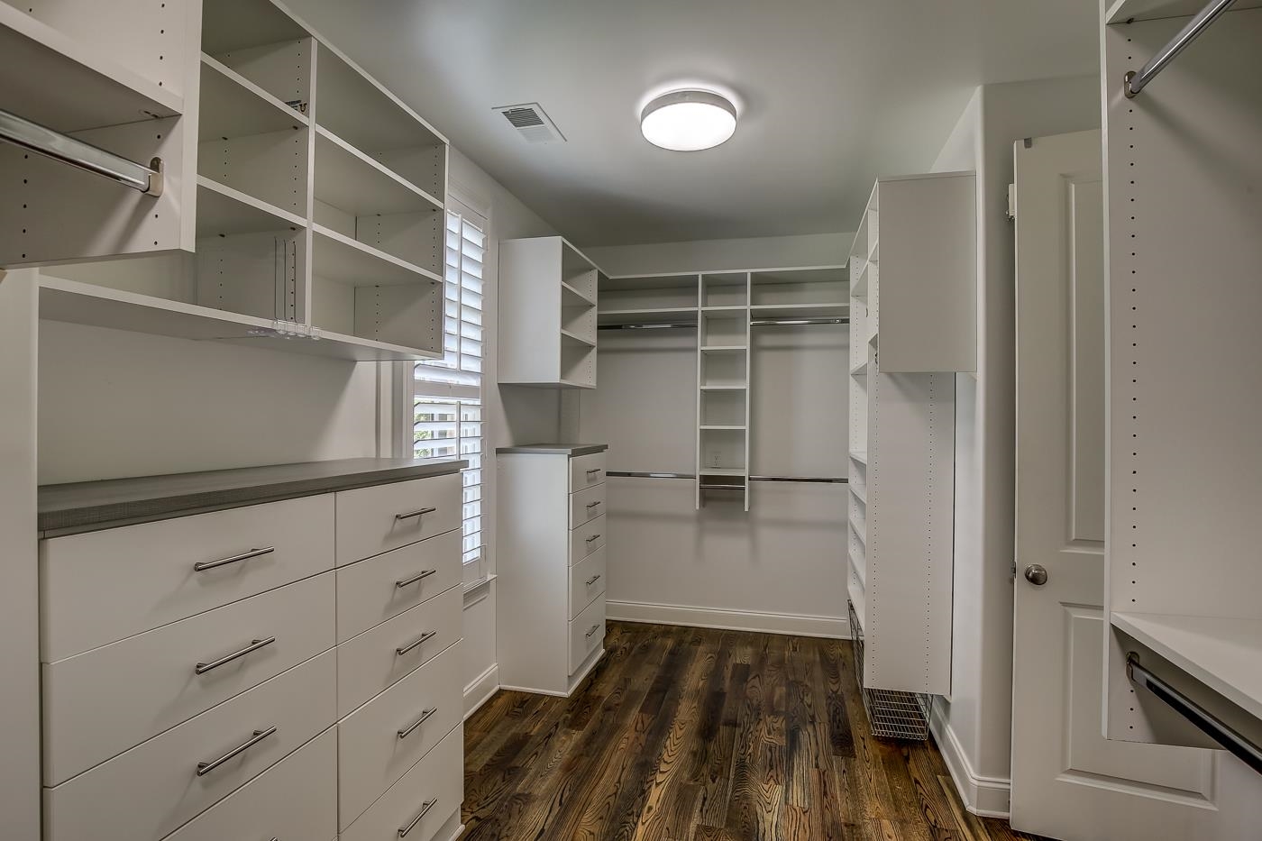 1908 Riverdale Road Germantown, TN 38138 - Photo 18 of 40 Walk in closet with dark hardwood / wood-style flooring