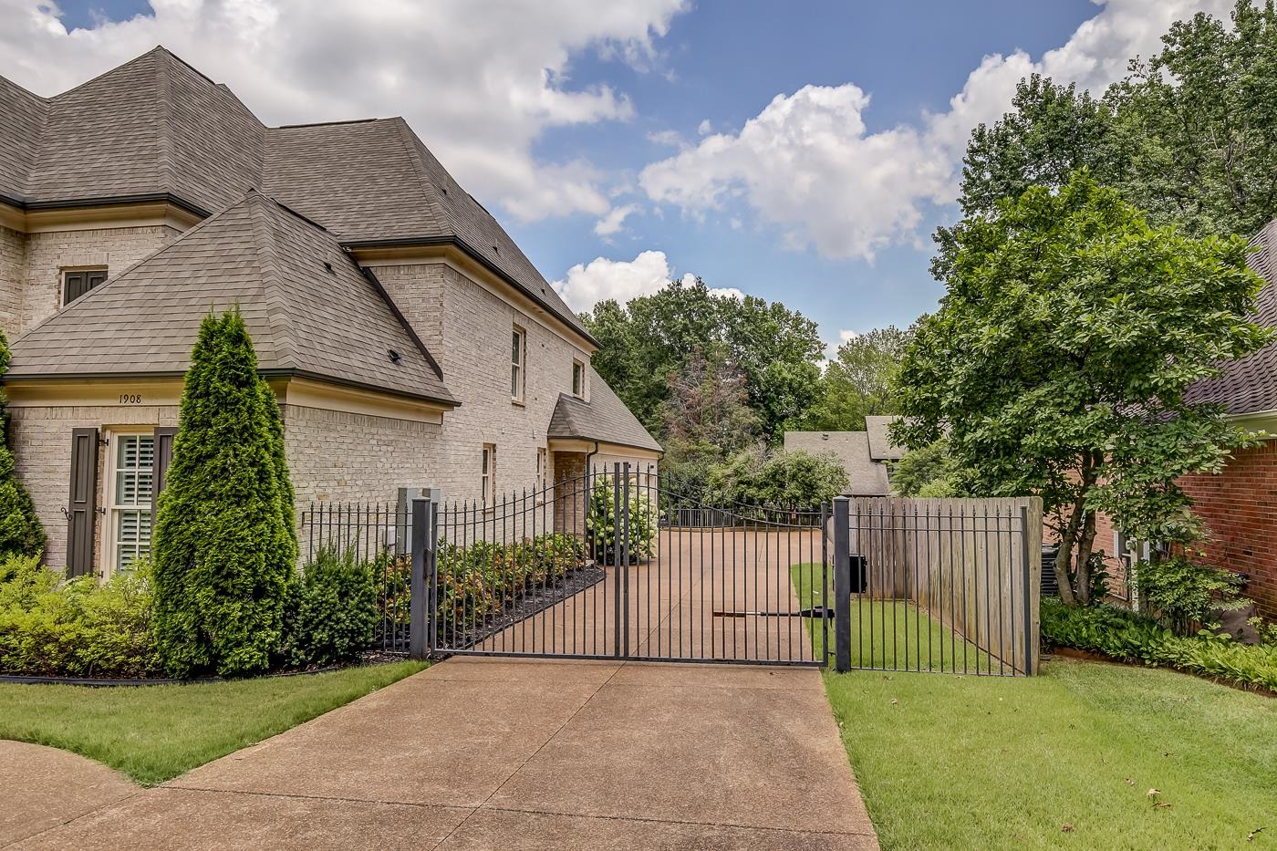 1908 Riverdale Road Germantown, TN 38138 - Photo 2 of 40 Long driveway to 3 Car Garage in rear.