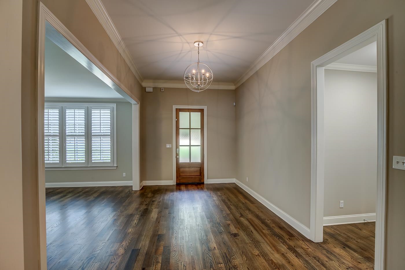 1908 Riverdale Road Germantown, TN 38138 - Photo 3 of 40 11' ceiling with 2 piece crown molding, hardwood floor, and custom lighting.
