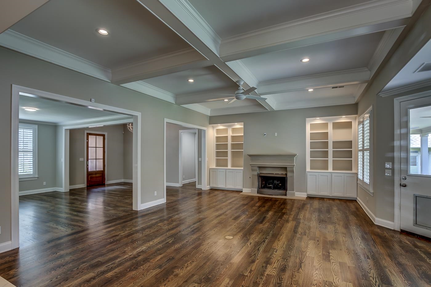 1908 Riverdale Road Germantown, TN 38138 - Photo 4 of 40 11' "box" beam ceiling with 2 piece crown molding, 6 recessed can lights, ceiling fan with light and hardwood floor.
