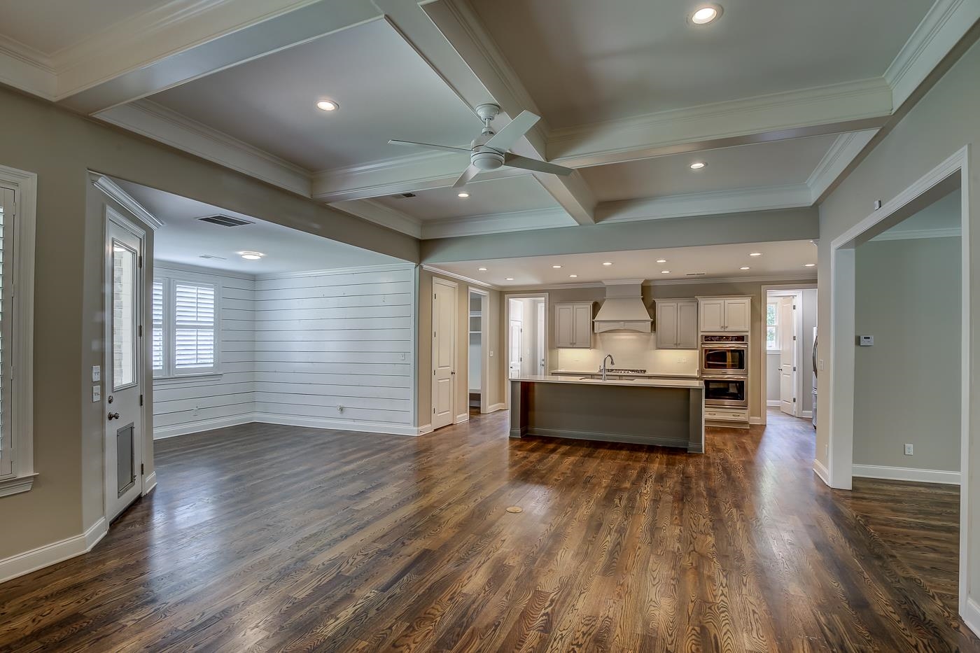 1908 Riverdale Road Germantown, TN 38138 - Photo 7 of 40 Box Beam ceiling with 2 piece crown molding. Door to Covered Patio next to Breakfast Area with Shiplap walls.