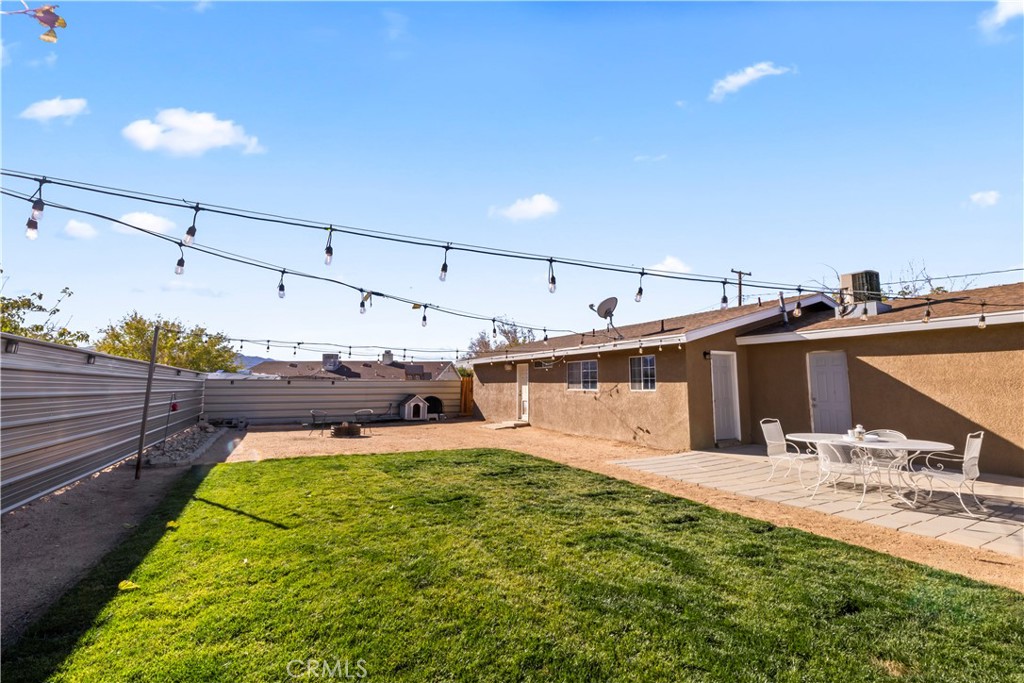 8755 Devon Avenue Hesperia, CA 92345 - Photo 27 of 45 a view of a backyard with sitting area