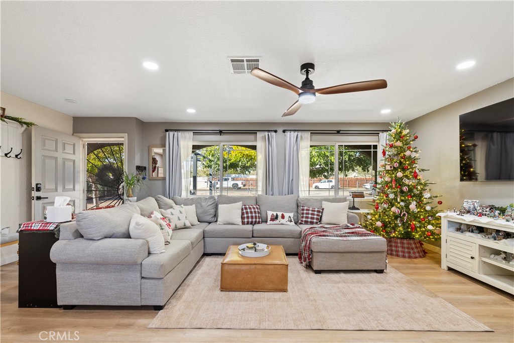 8755 Devon Avenue Hesperia, CA 92345 - Photo 3 of 45 a living room with furniture and a large window