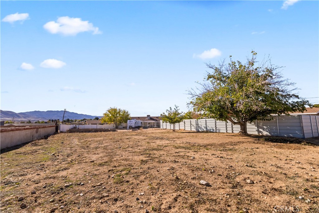 8755 Devon Avenue Hesperia, CA 92345 - Photo 34 of 45 a view of an outdoor space and a yard