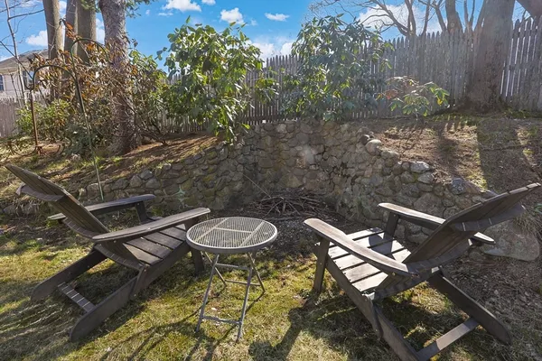 a view of a backyard of a house