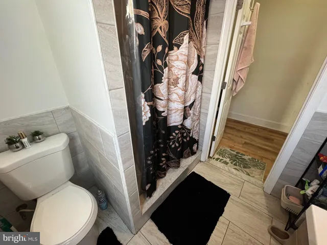a view of a kitchen with appliances and cabinets