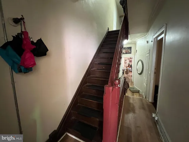a living room with furniture and flat screen tv