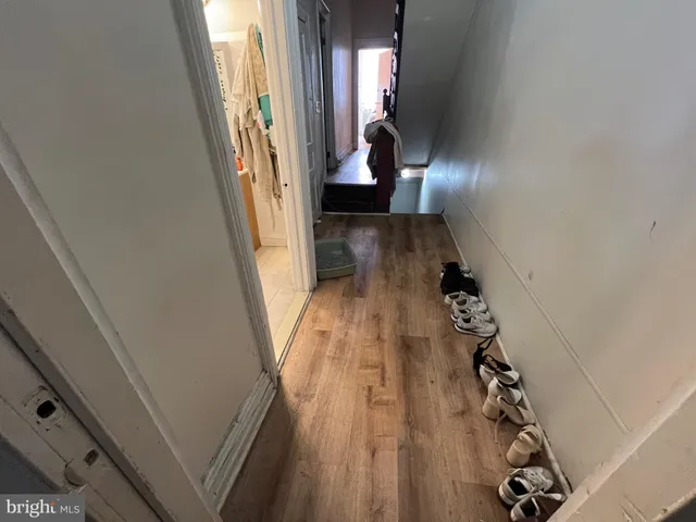 a kitchen with refrigerator a washer and dryer