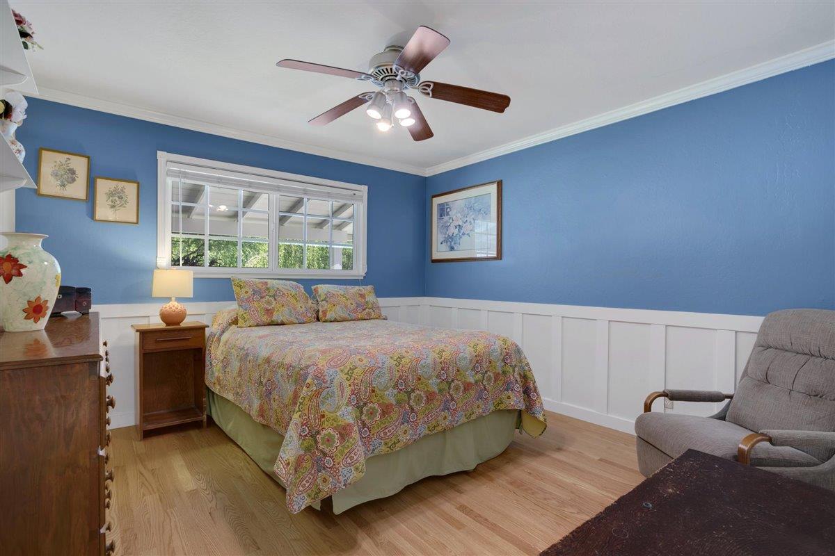 8085 Solis Rancho Drive Gilroy, CA 95020 - Photo 16 of 26 a bedroom with a bed couch and window