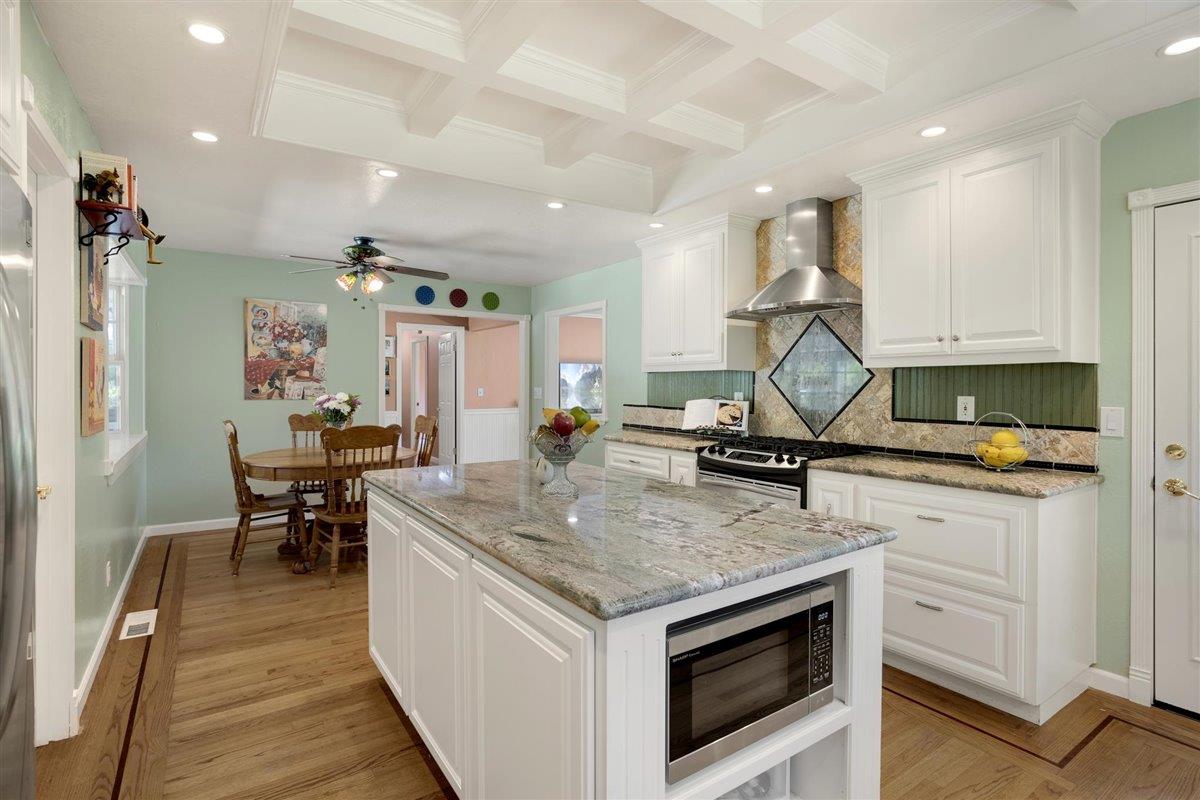 8085 Solis Rancho Drive Gilroy, CA 95020 - Photo 20 of 26 a kitchen with a stove a sink and a refrigerator