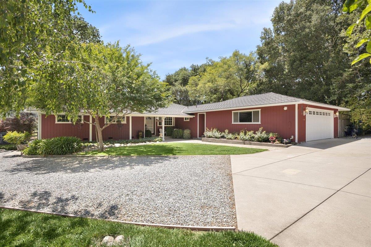 8085 Solis Rancho Drive Gilroy, CA 95020 - Photo 23 of 26 a front view of house with a garden
