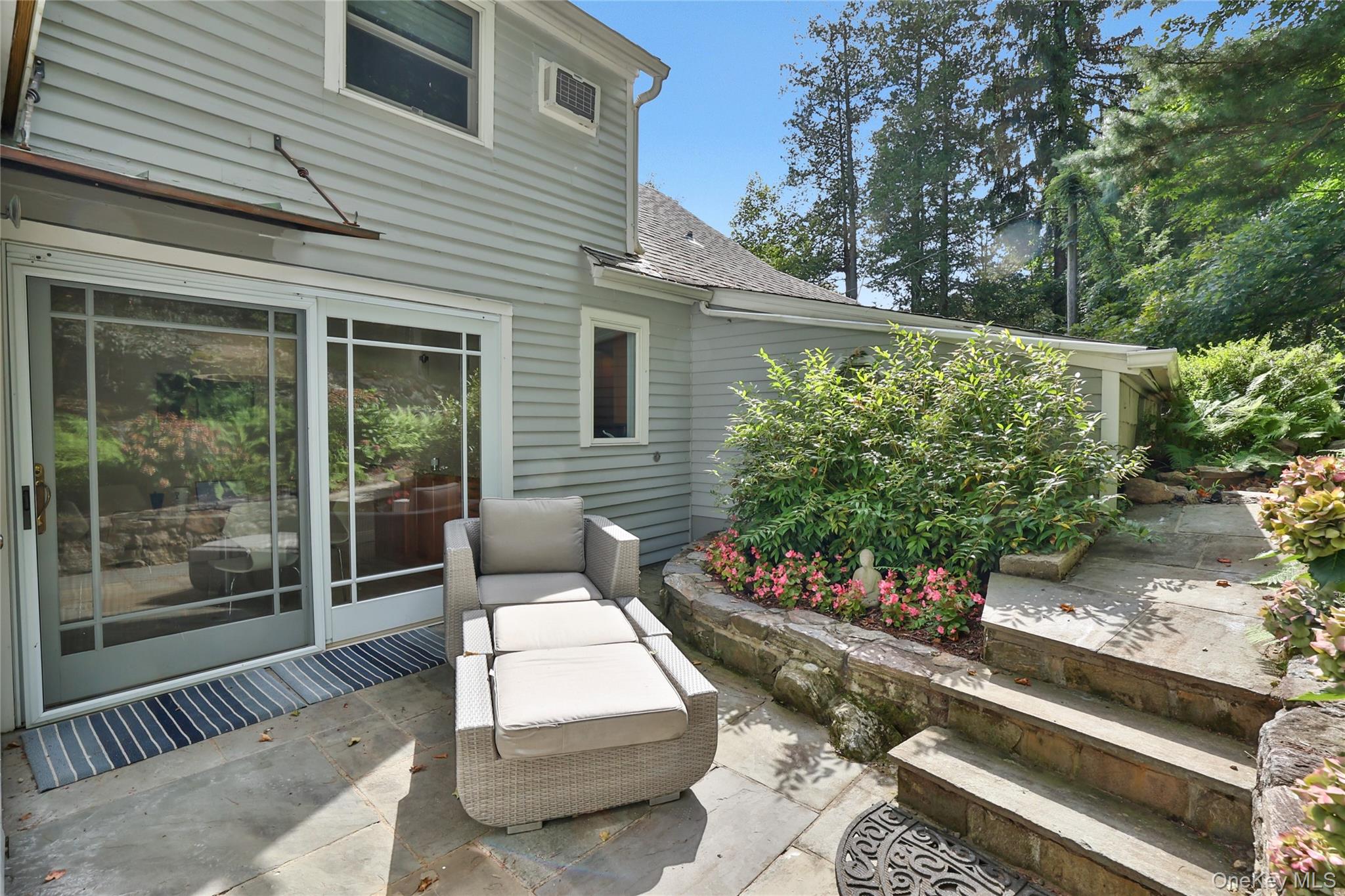 8 Old Roaring Brook Road Mount Kisco, NY 10549 - Photo 12 of 47 a view of a two chairs in the patio