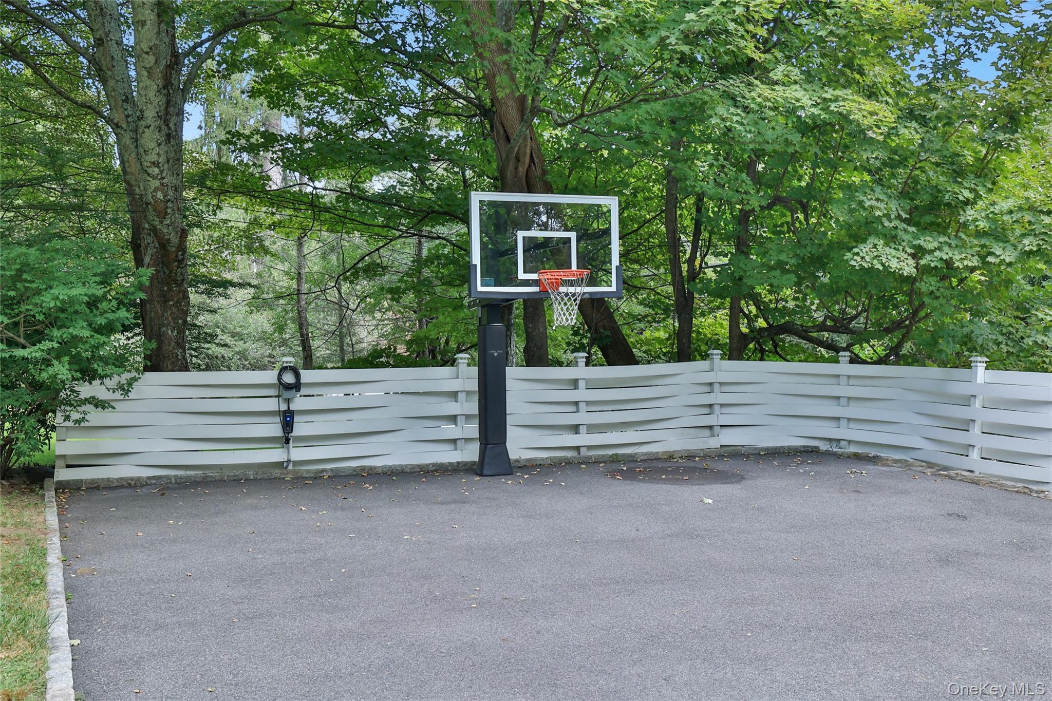 8 Old Roaring Brook Road Mount Kisco, NY 10549 - Photo 20 of 47 a view of a house with a yard