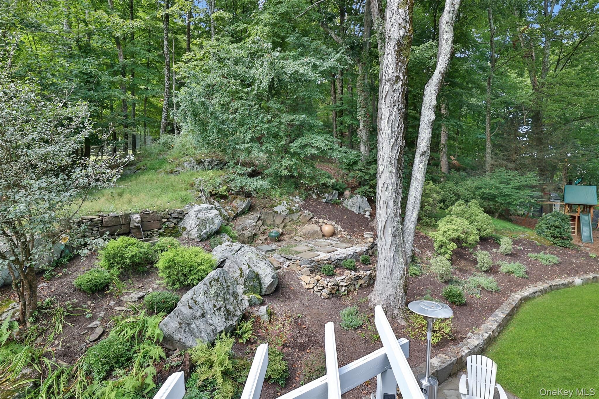 8 Old Roaring Brook Road Mount Kisco, NY 10549 - Photo 21 of 47 a view of a forest with a tree