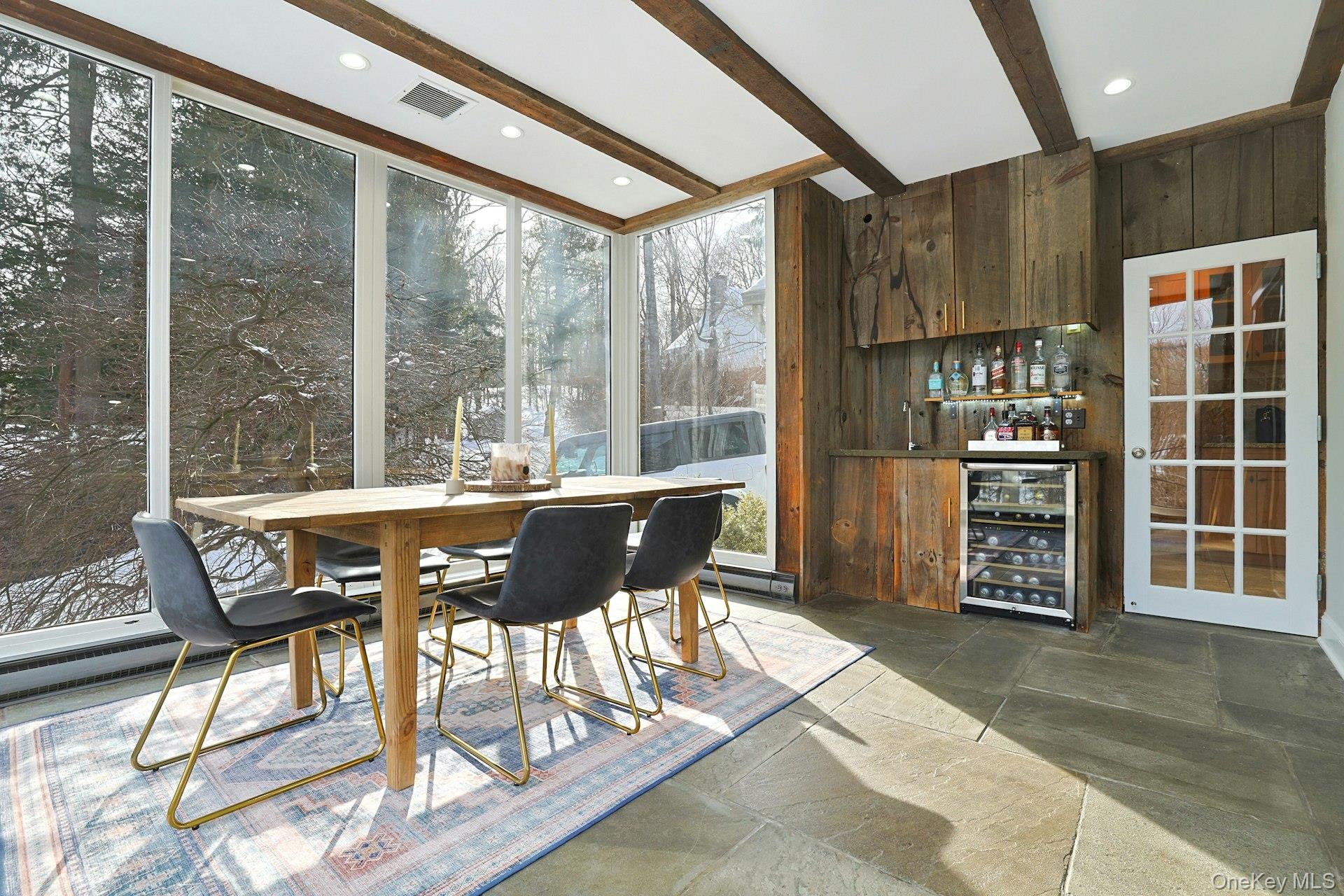 8 Old Roaring Brook Road Mount Kisco, NY 10549 - Photo 29 of 47 a dining room with furniture and wooden floor