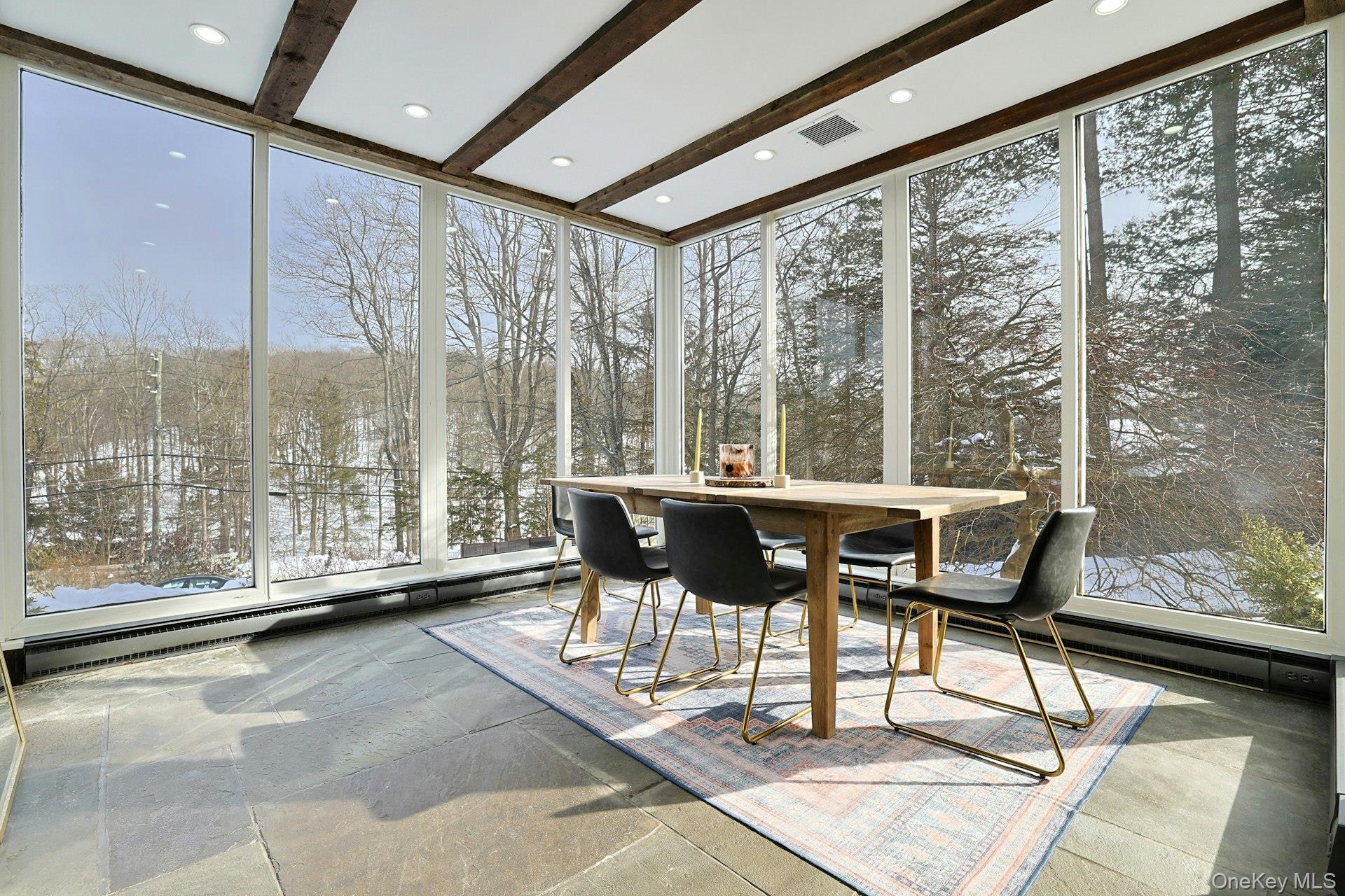 8 Old Roaring Brook Road Mount Kisco, NY 10549 - Photo 30 of 47 a view of a big room with furniture and large windows