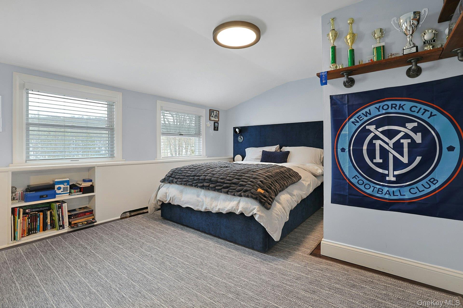 8 Old Roaring Brook Road Mount Kisco, NY 10549 - Photo 40 of 47 a bedroom with a bed and a window