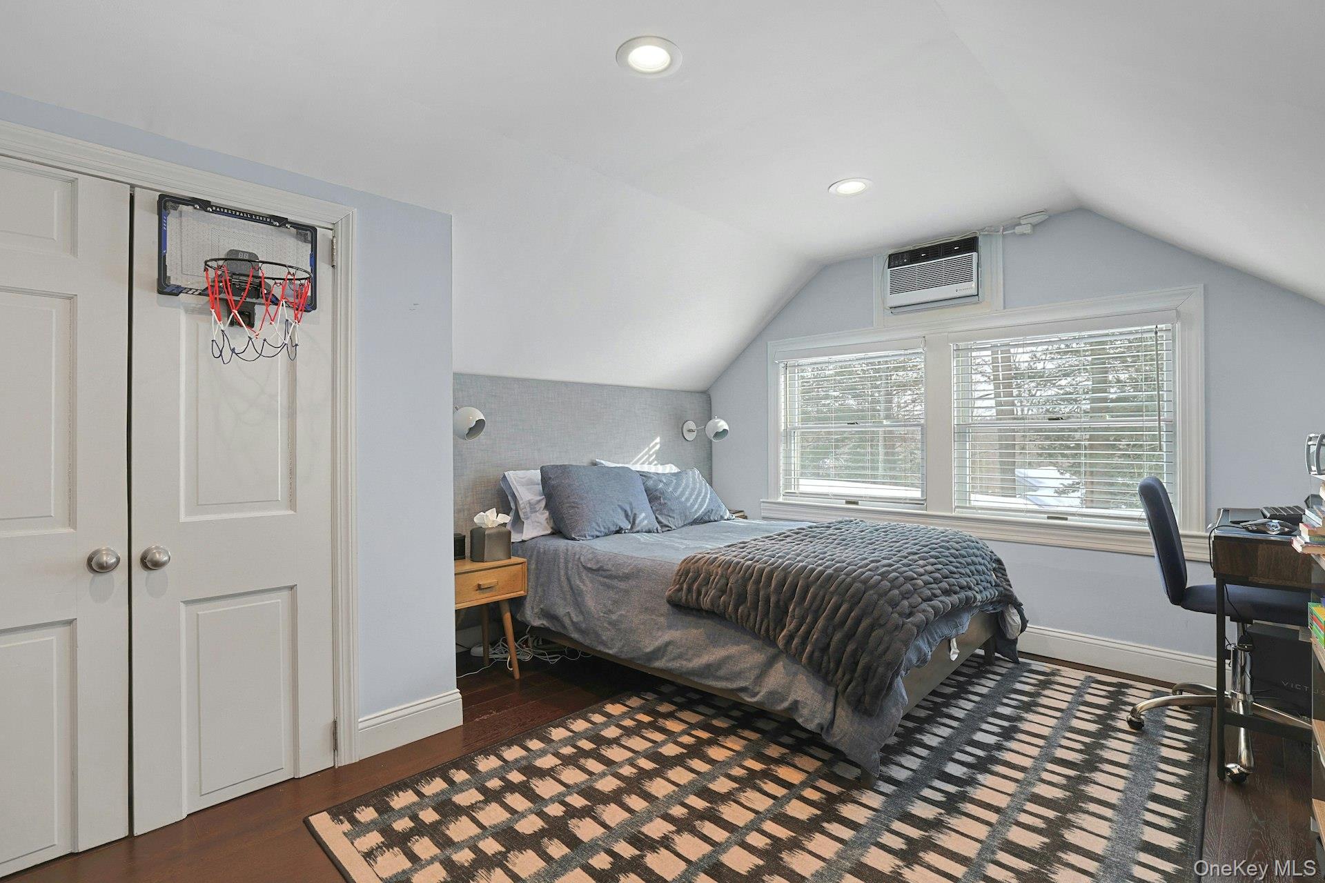 8 Old Roaring Brook Road Mount Kisco, NY 10549 - Photo 43 of 47 a bedroom with a bed and wooden floor