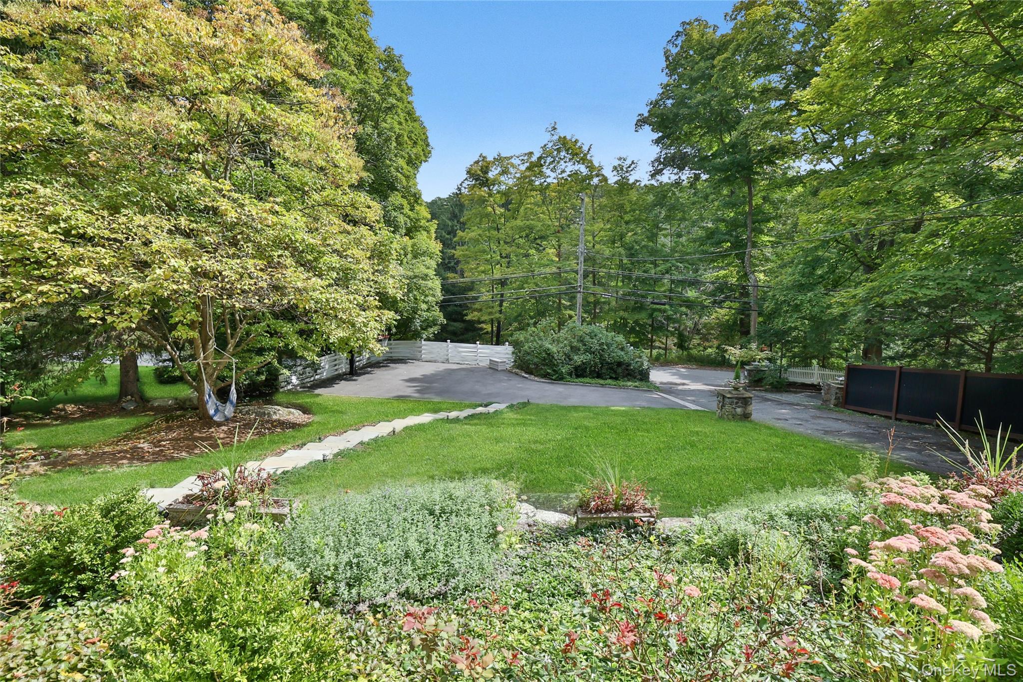8 Old Roaring Brook Road Mount Kisco, NY 10549 - Photo 6 of 47 a view of backyard with green space