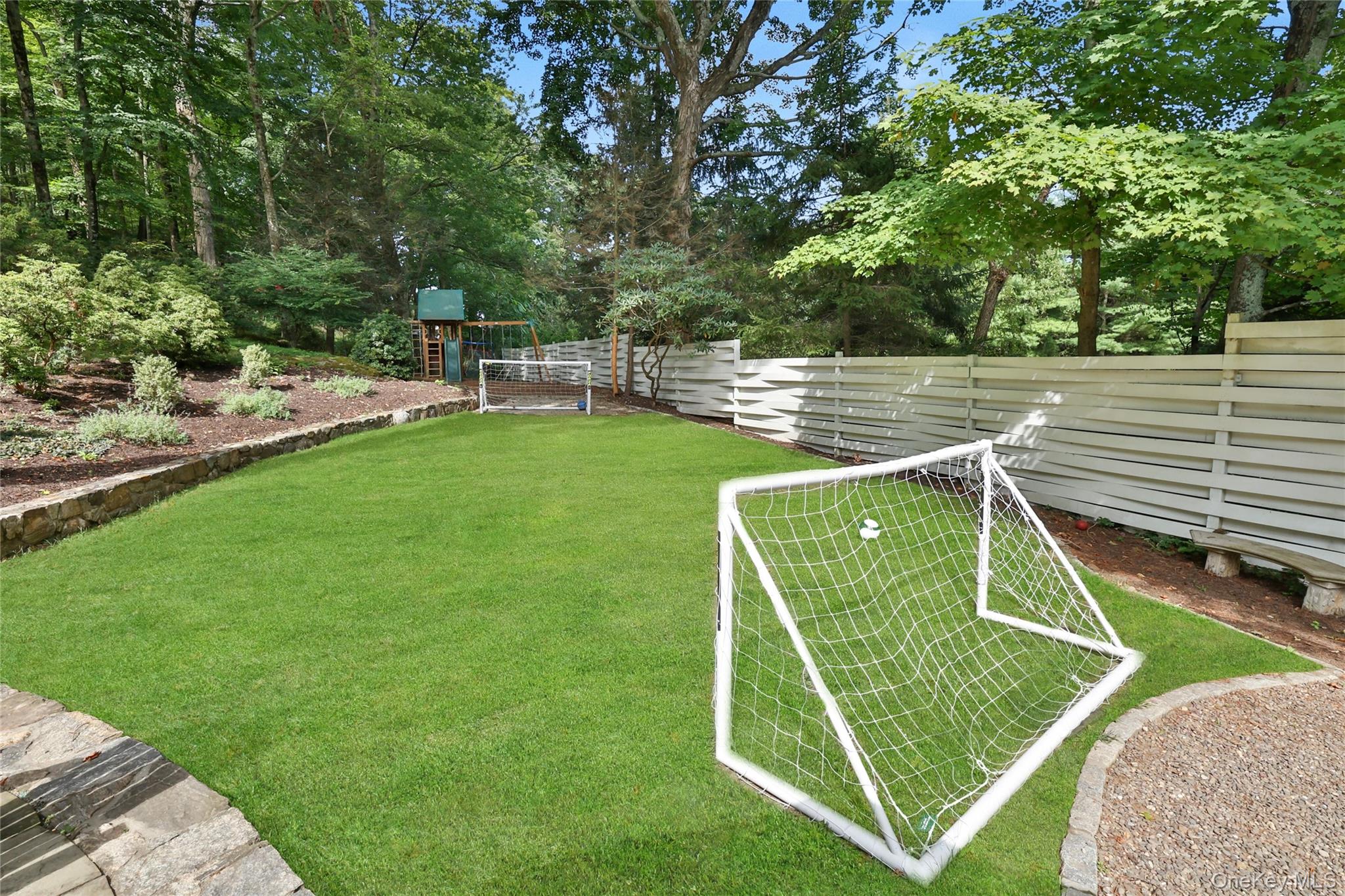 8 Old Roaring Brook Road Mount Kisco, NY 10549 - Photo 10 of 47 a view of a park with a slide