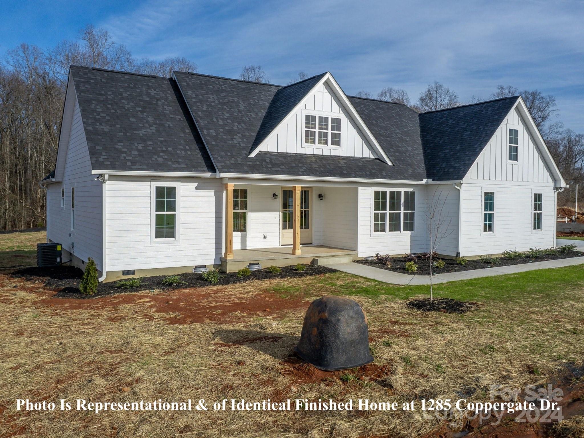 1375 Coppergate Drive Salisbury, NC 28147 - Photo 11 of 41 a front view of a house with a yard