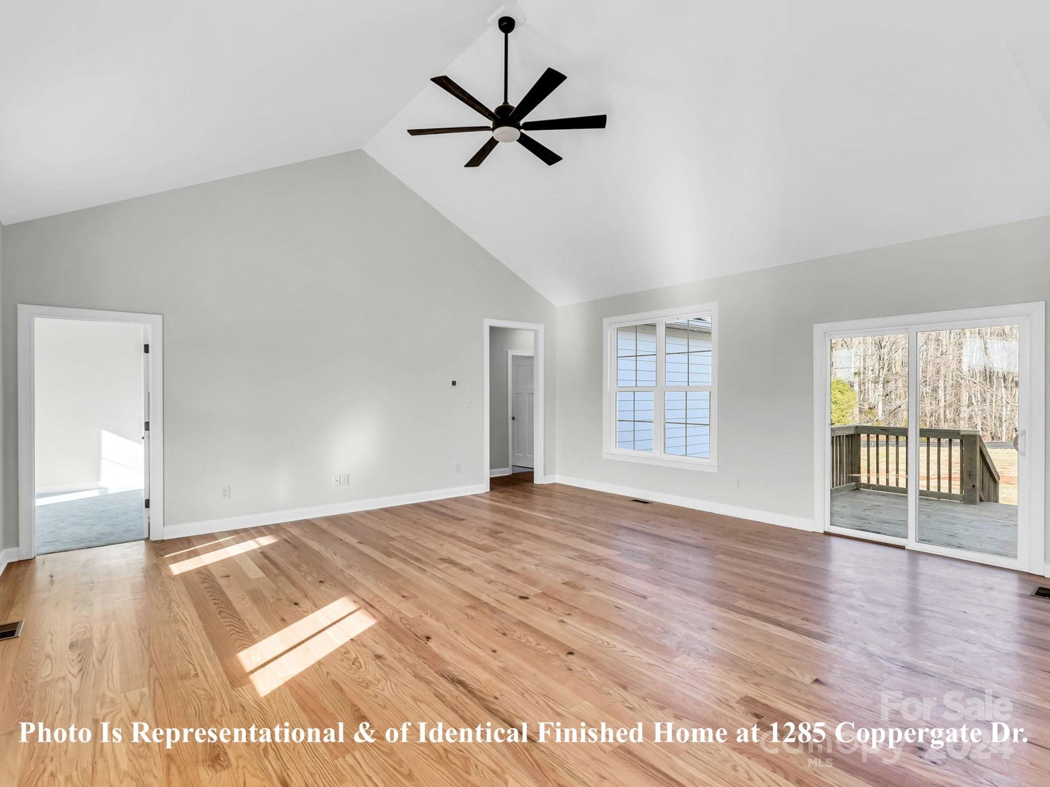 1375 Coppergate Drive Salisbury, NC 28147 - Photo 20 of 41 a view of empty room with wooden floor and fan