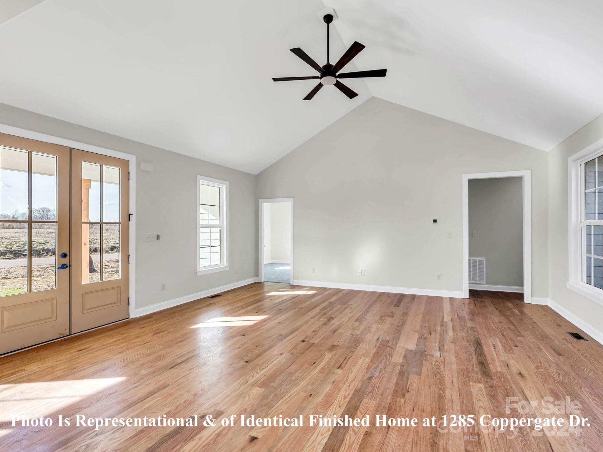 1375 Coppergate Drive Salisbury, NC 28147 - Photo 21 of 41 a view of empty room with wooden floor and fan