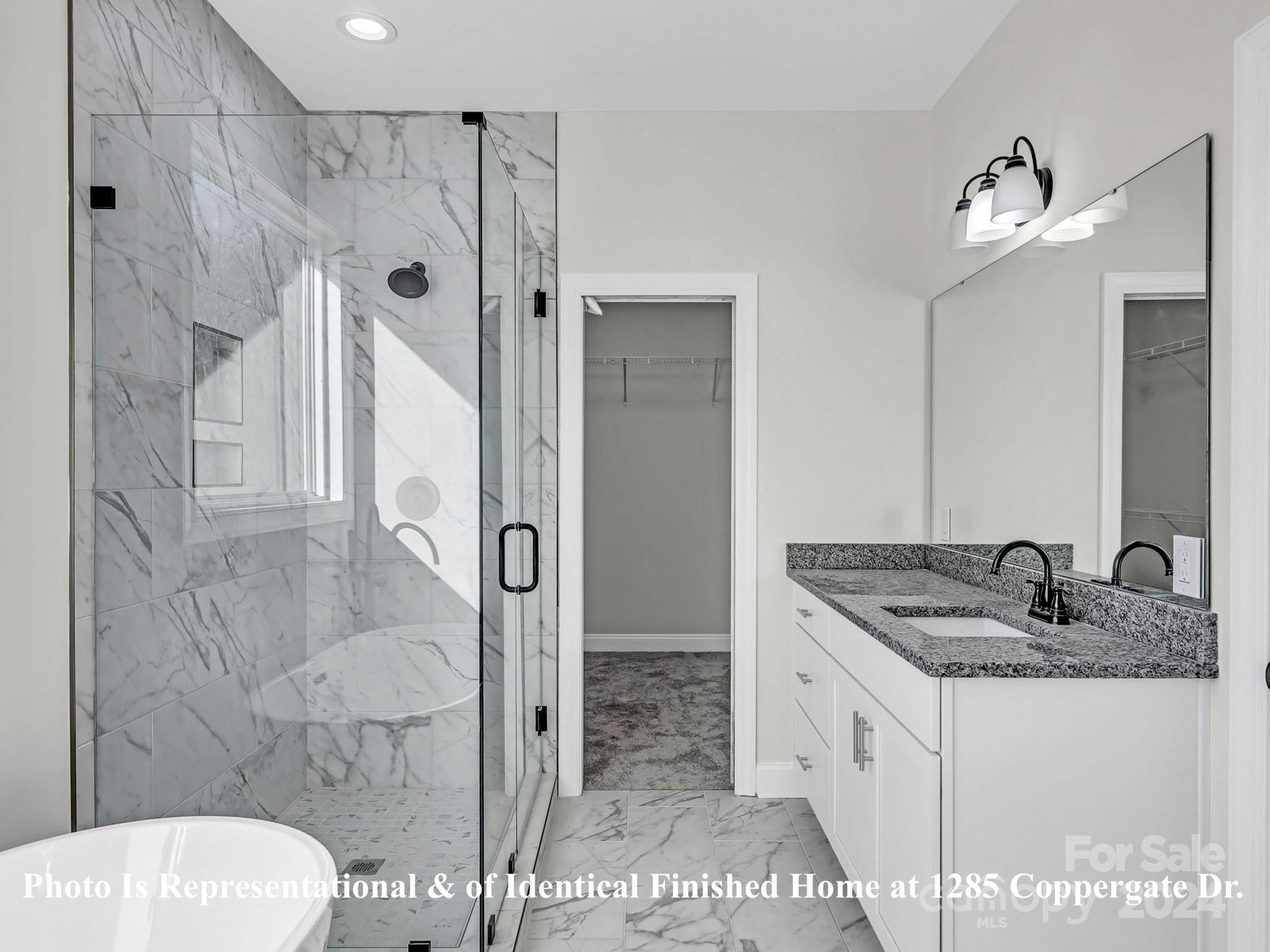 1375 Coppergate Drive Salisbury, NC 28147 - Photo 3 of 41 a bathroom with a granite countertop sink toilet and shower