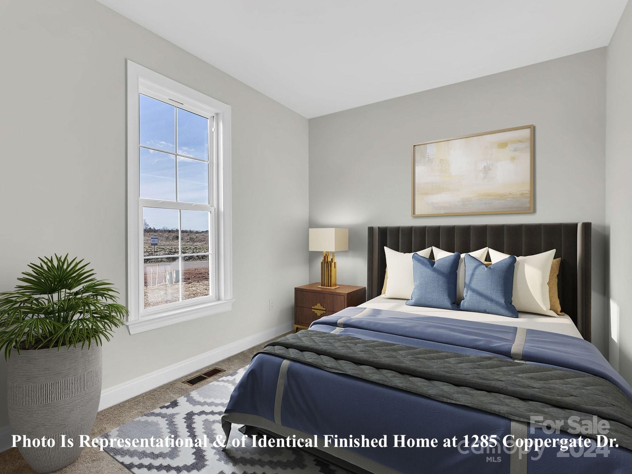 1375 Coppergate Drive Salisbury, NC 28147 - Photo 6 of 41 a bedroom with a bed and a window