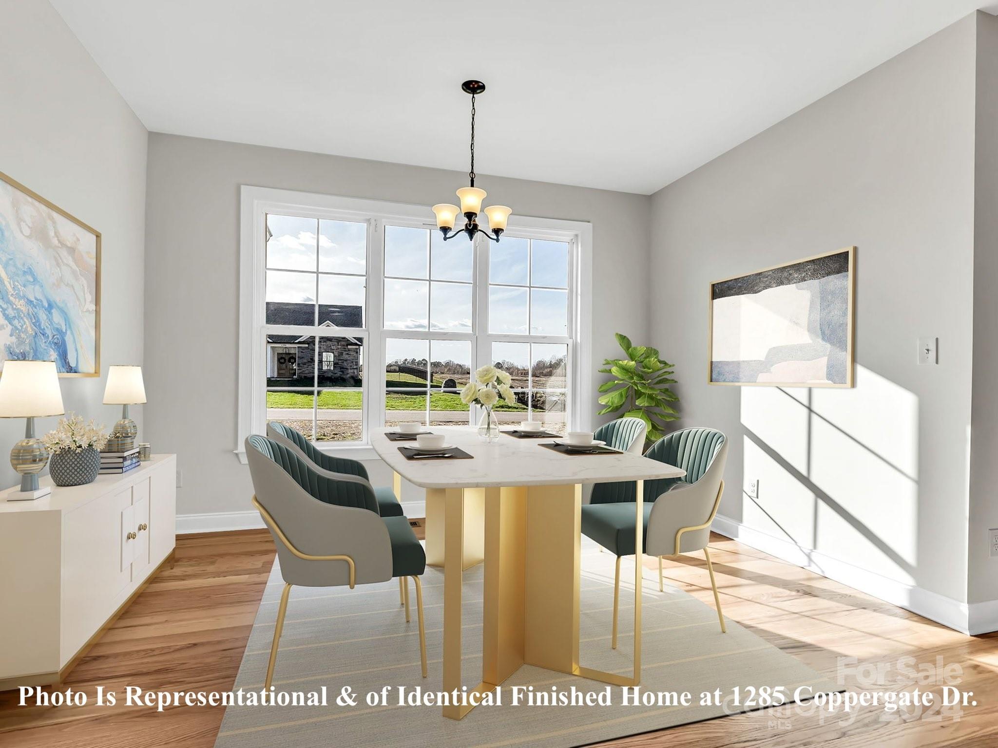 1375 Coppergate Drive Salisbury, NC 28147 - Photo 8 of 41 a view of a dining room with furniture