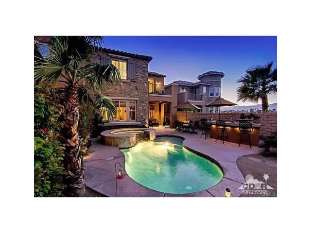 a picture of a living room with furniture