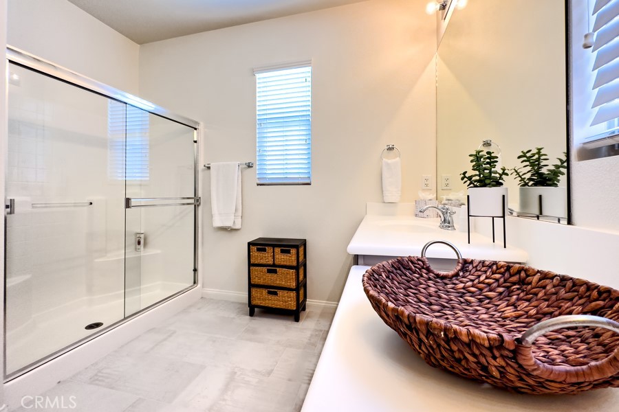 43183 Bacino Court Indio, CA 92203 - Photo 11 of 20 a living room with a bed and next to a window