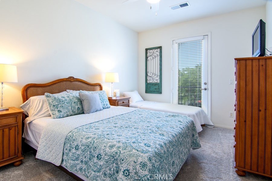 43183 Bacino Court Indio, CA 92203 - Photo 9 of 20 a bedroom with a bed and a window