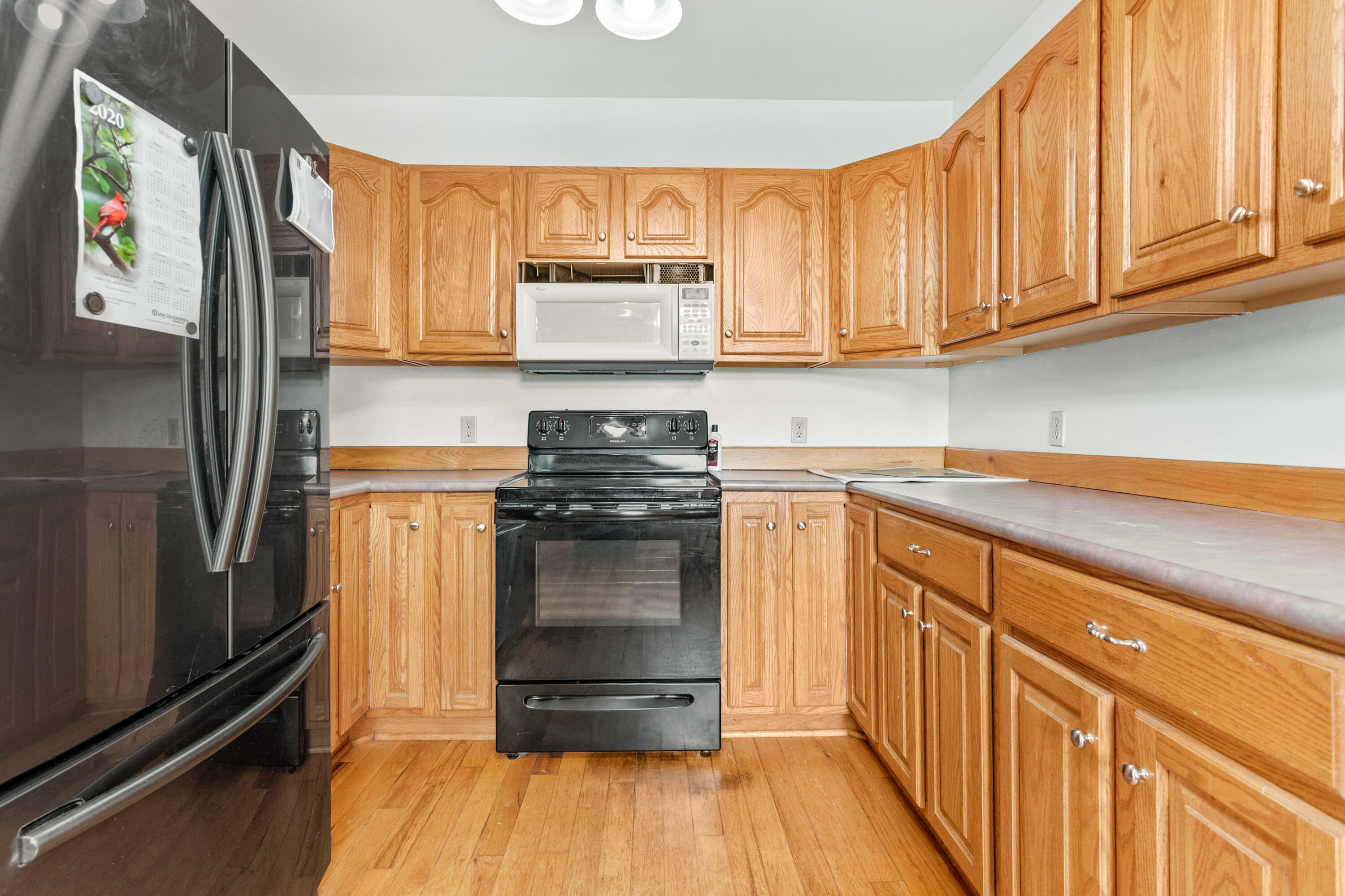 223 Conner Grove Road Southwest Willis, VA 24380 - Photo 17 of 74 a kitchen with a refrigerator and a sink