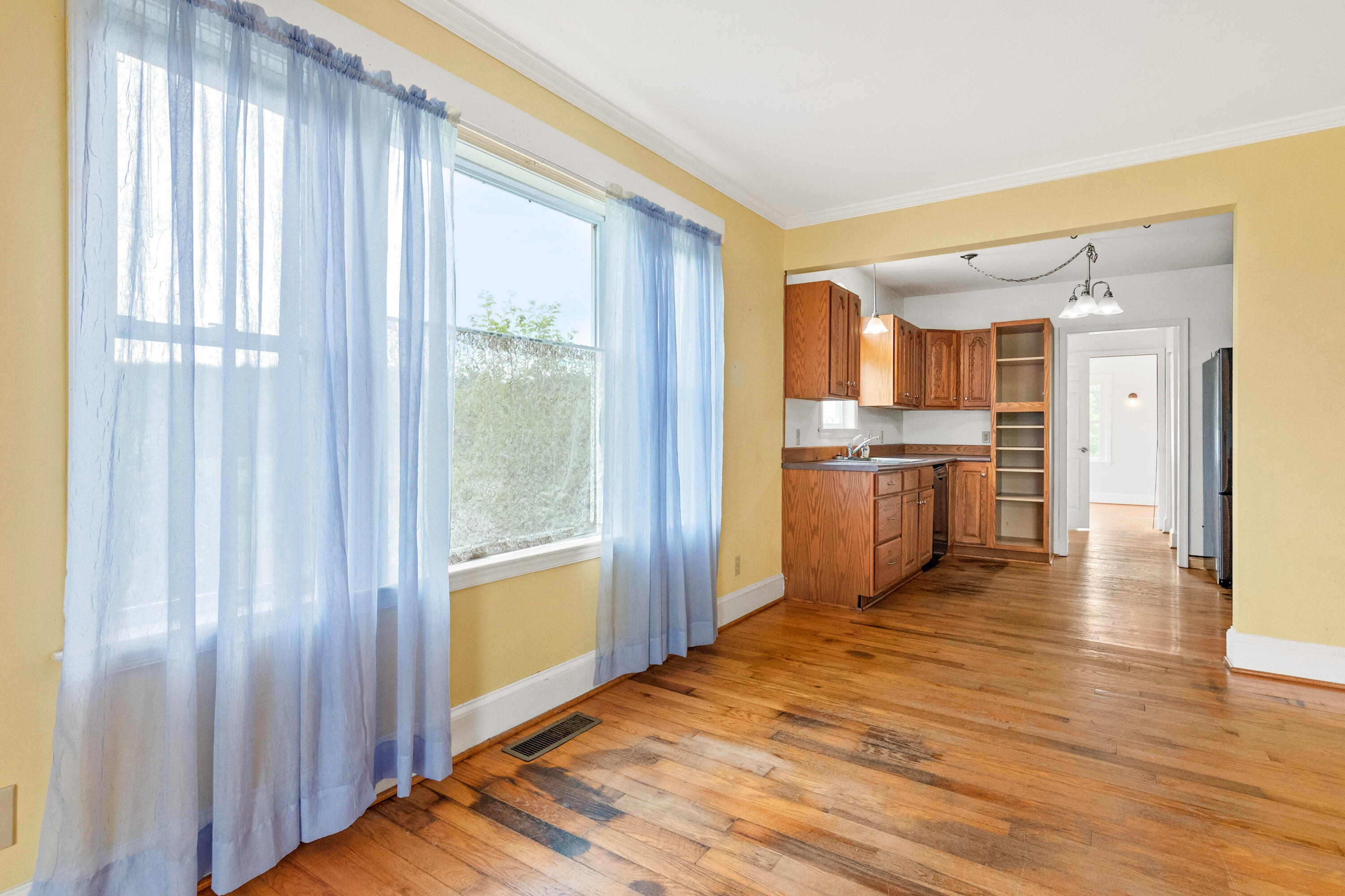 223 Conner Grove Road Southwest Willis, VA 24380 - Photo 24 of 74 a view of a kitchen with wooden floor and a kitchen