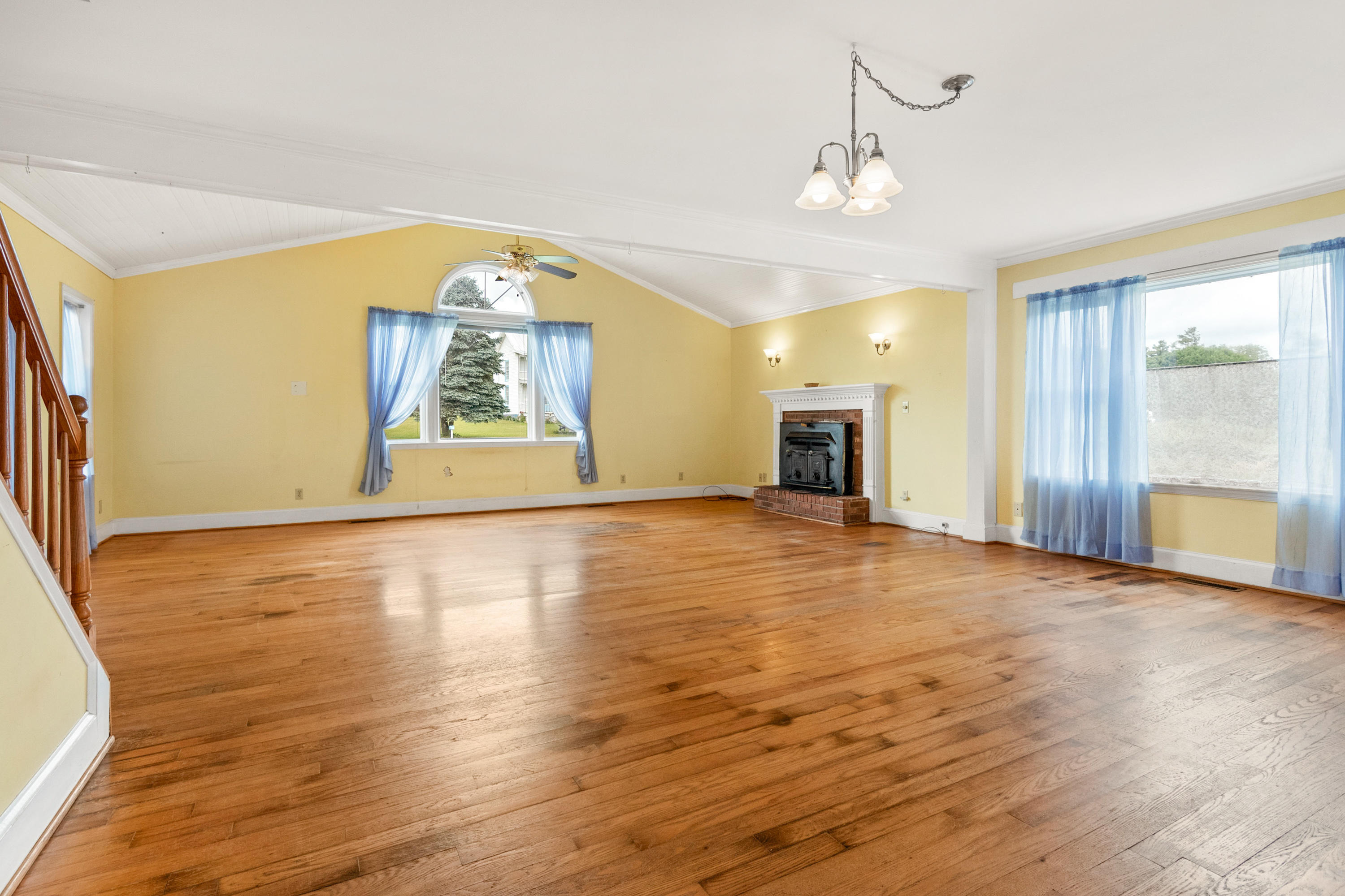 223 Conner Grove Road Southwest Willis, VA 24380 - Photo 26 of 74 an empty room with wooden floor and windows