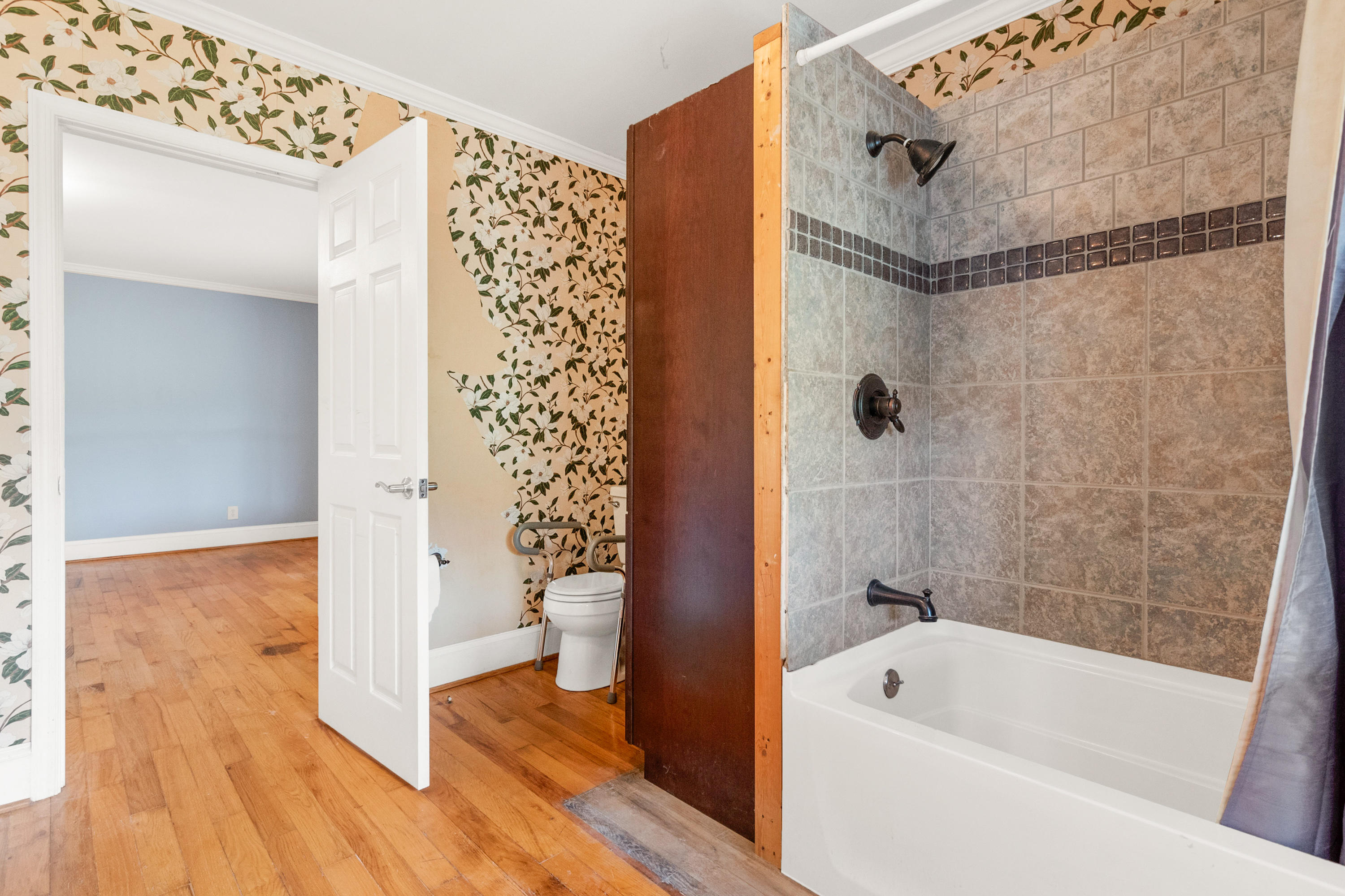 223 Conner Grove Road Southwest Willis, VA 24380 - Photo 32 of 74 a bathroom with a bathtub and a shower