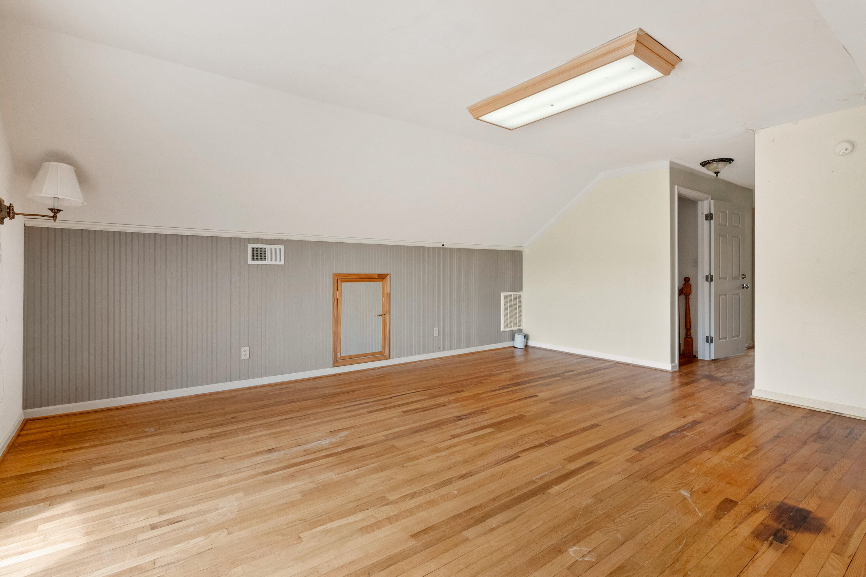 223 Conner Grove Road Southwest Willis, VA 24380 - Photo 41 of 74 a view of empty room with wooden floor