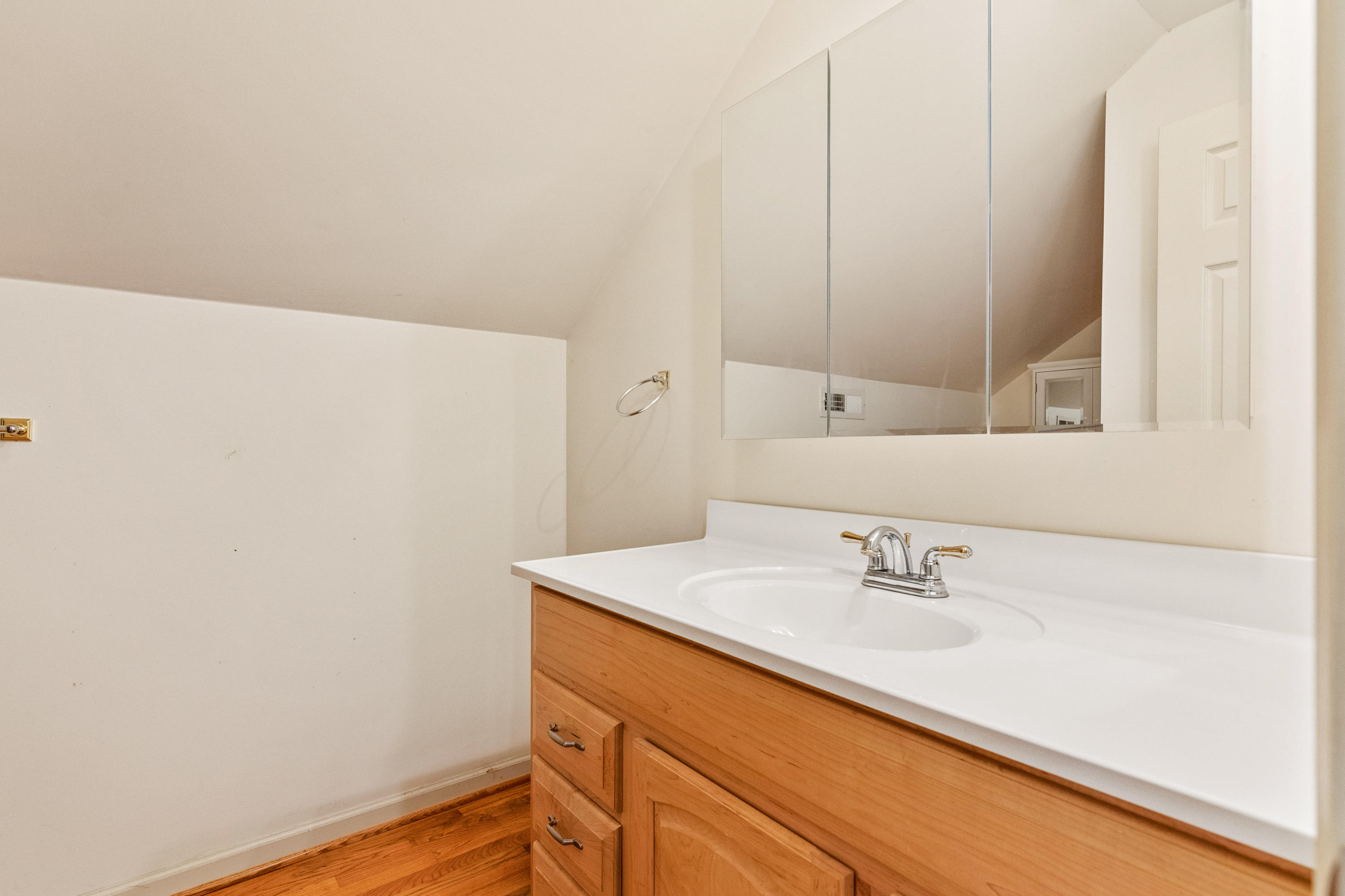 223 Conner Grove Road Southwest Willis, VA 24380 - Photo 43 of 74 a bathroom with a sink and a mirror