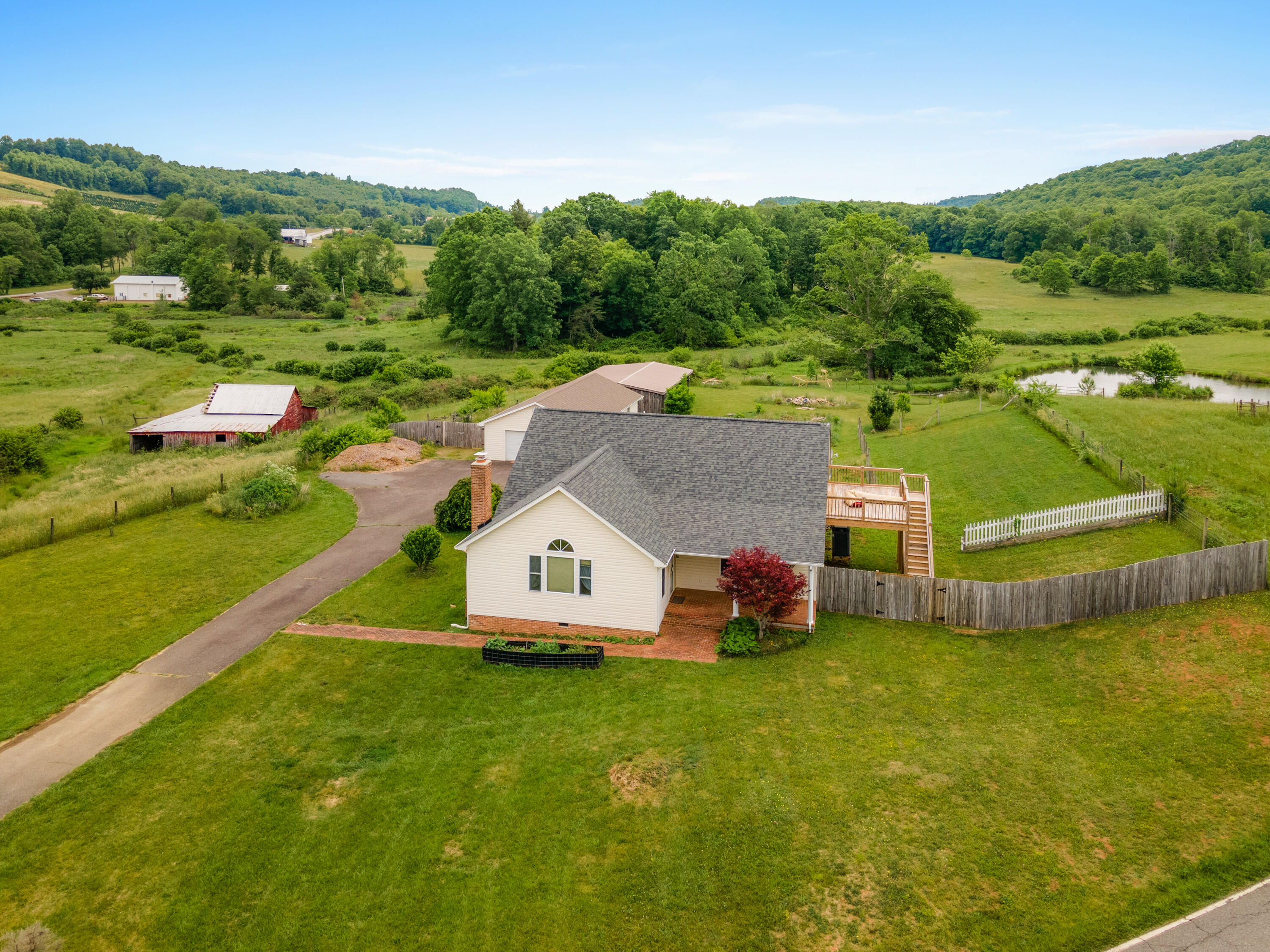 223 Conner Grove Road Southwest Willis, VA 24380 - Photo 45 of 74 a view of a house with a yard