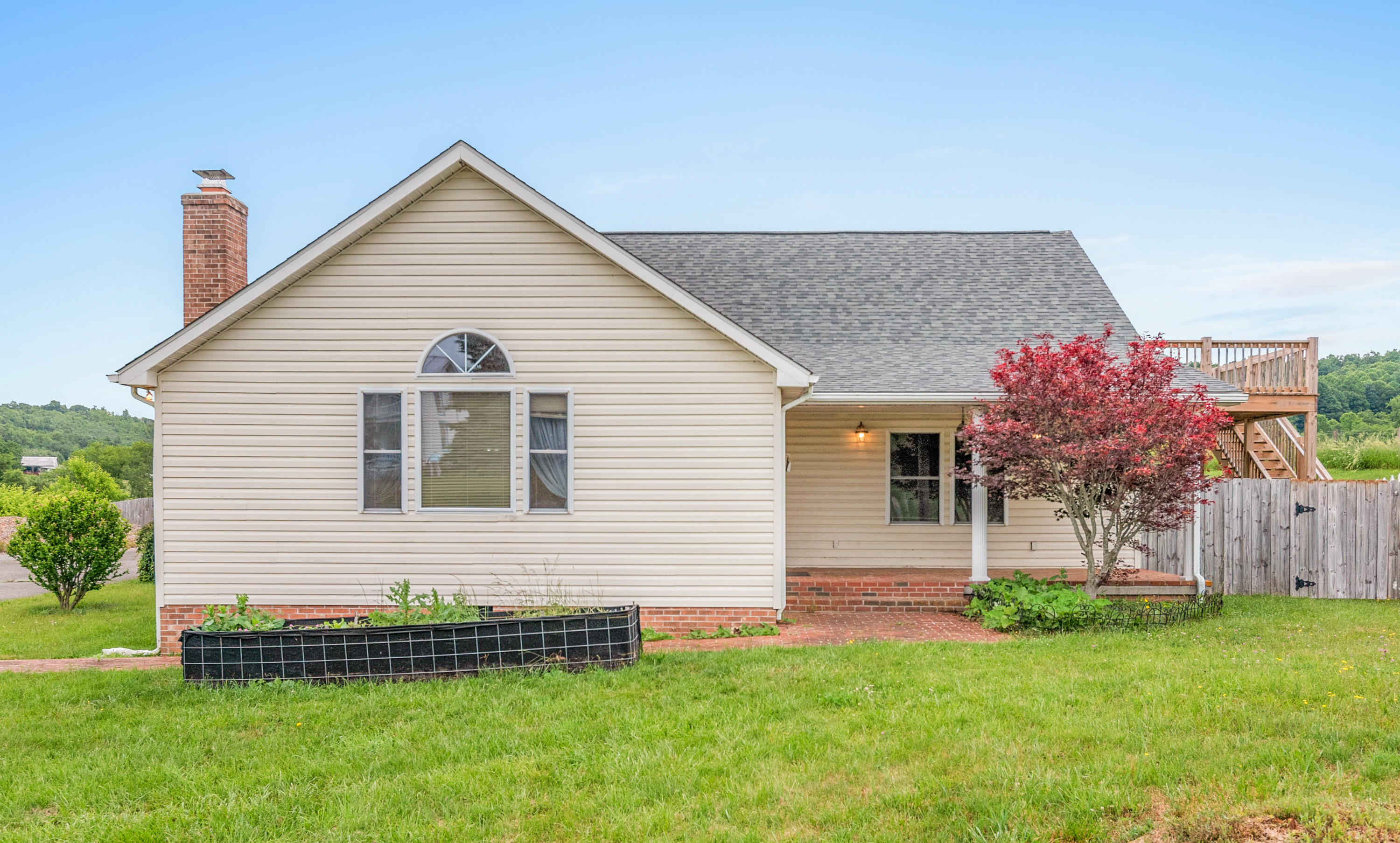 223 Conner Grove Road Southwest Willis, VA 24380 - Photo 6 of 74 a front view of house with a garden