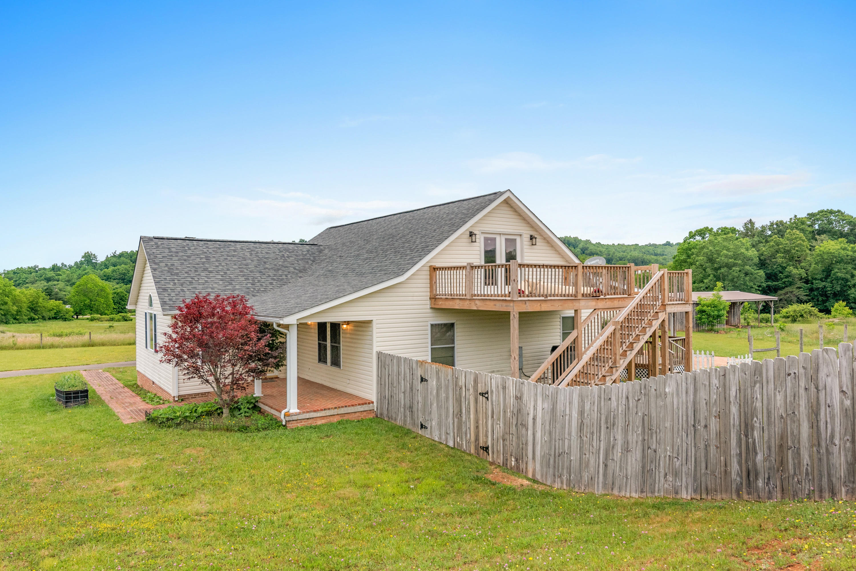 223 Conner Grove Road Southwest Willis, VA 24380 - Photo 53 of 74 a view of a house with a yard