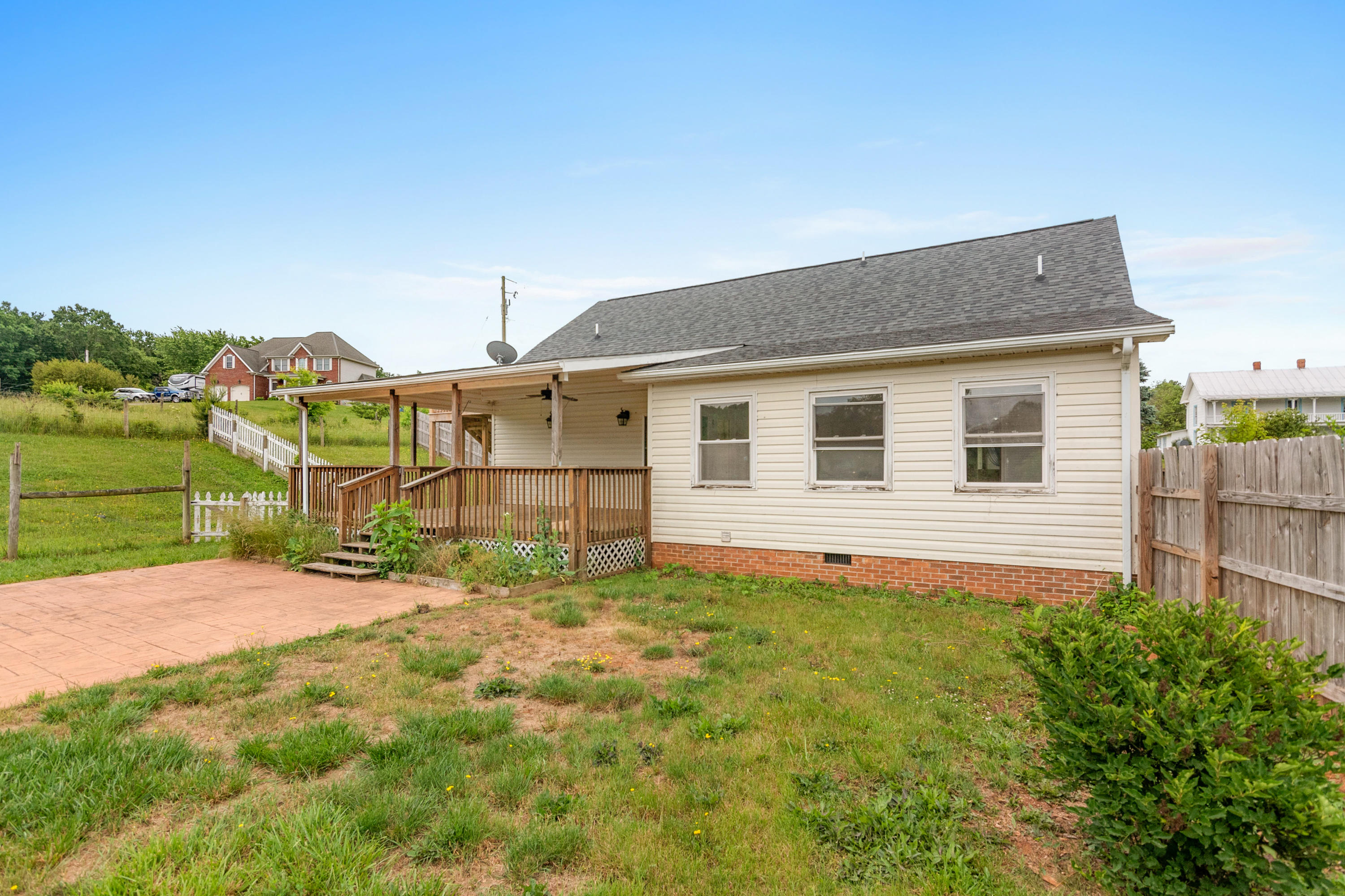 223 Conner Grove Road Southwest Willis, VA 24380 - Photo 56 of 74 a house view with a garden space