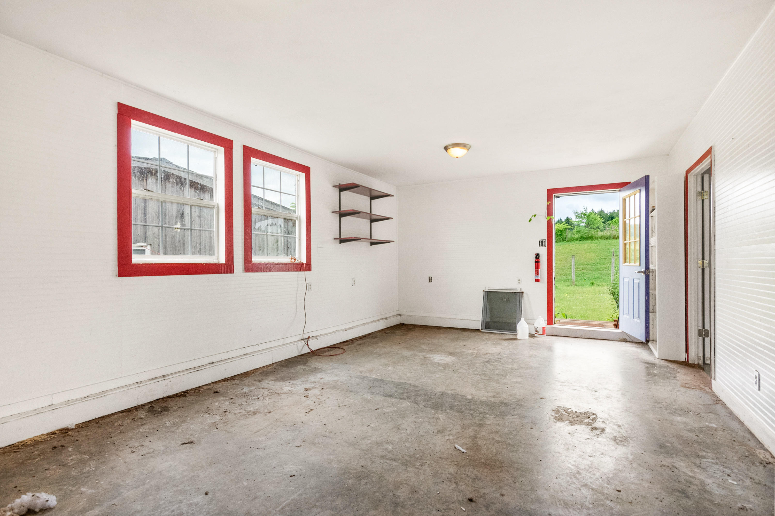 223 Conner Grove Road Southwest Willis, VA 24380 - Photo 63 of 74 an empty room with windows