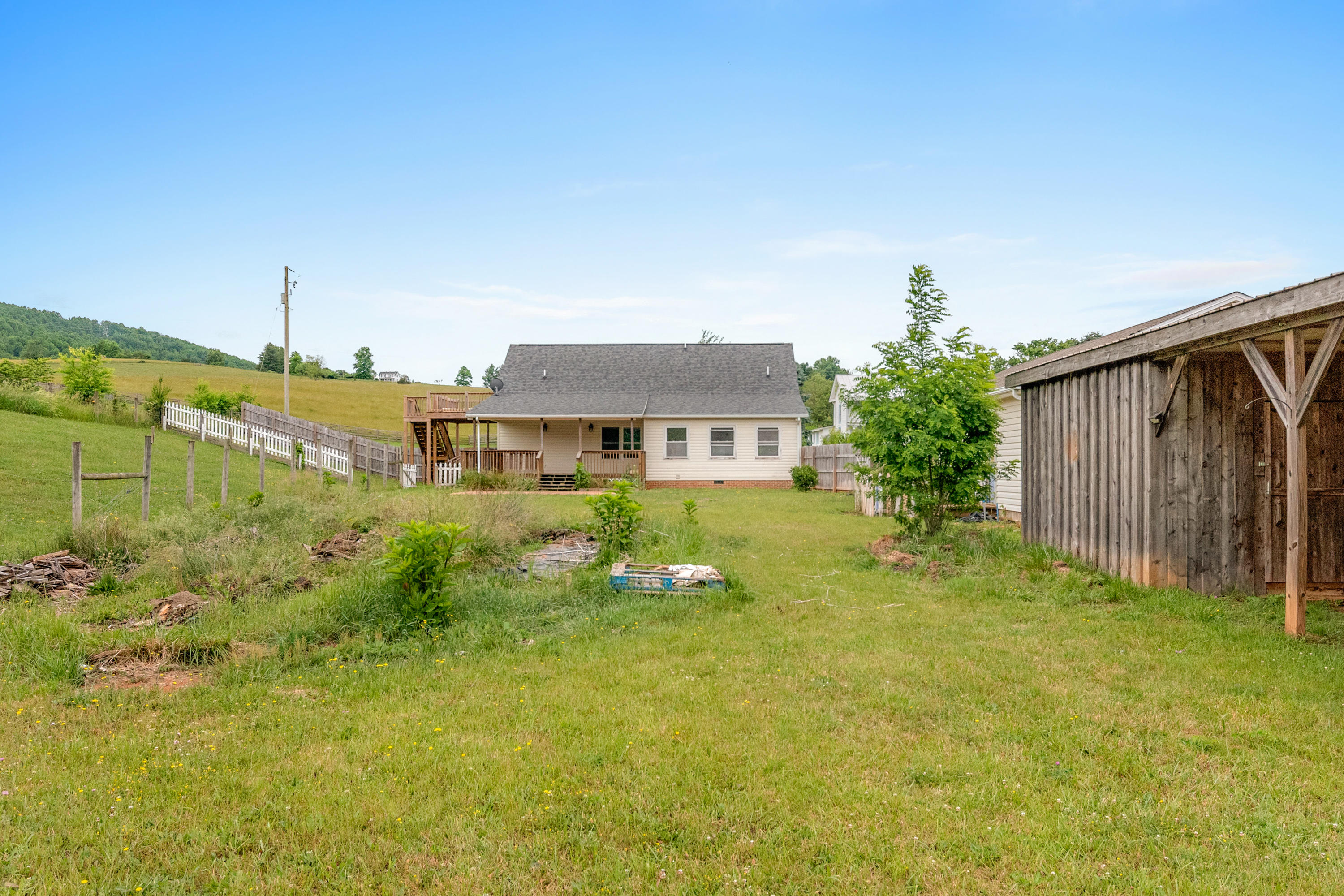 223 Conner Grove Road Southwest Willis, VA 24380 - Photo 65 of 74 a front view of house with garden