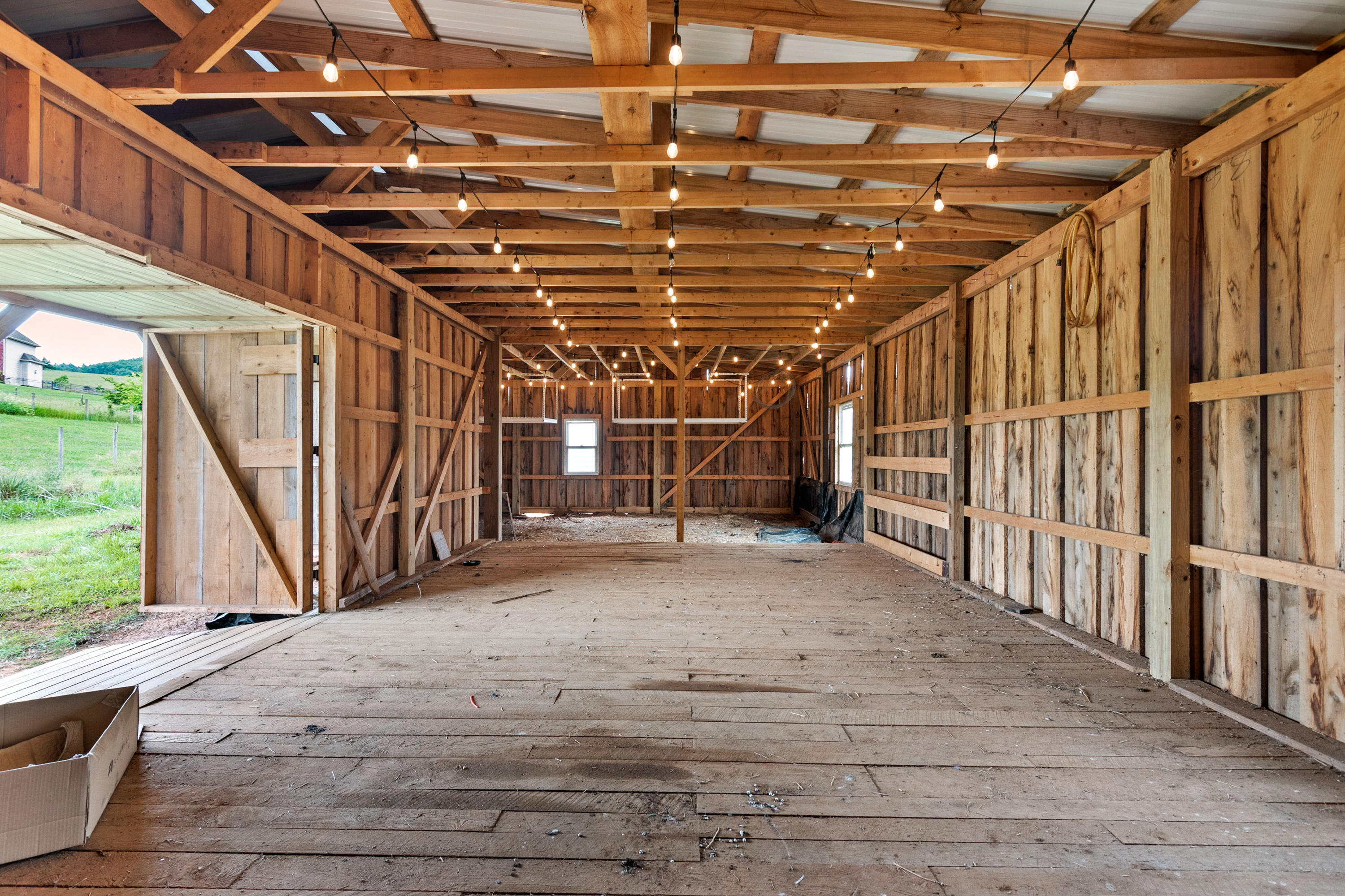 223 Conner Grove Road Southwest Willis, VA 24380 - Photo 72 of 74 a view of an empty room with wooden floor
