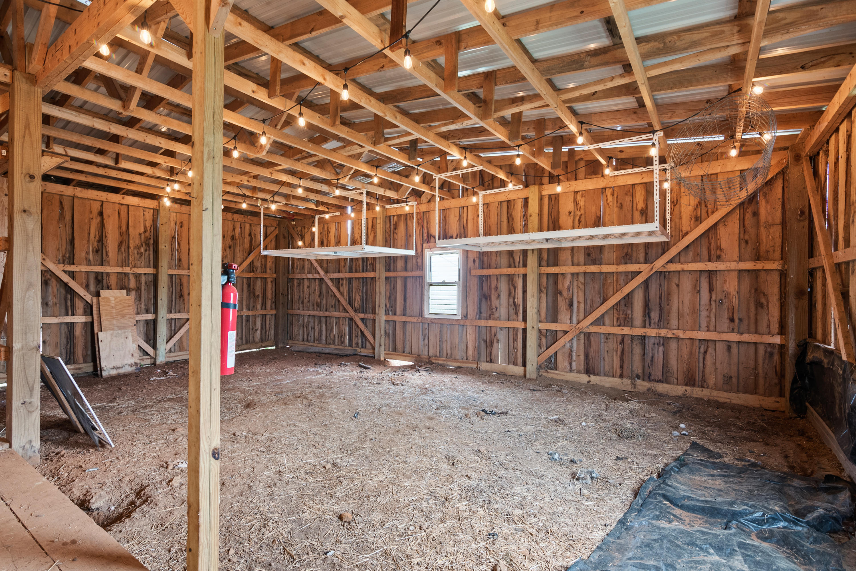 223 Conner Grove Road Southwest Willis, VA 24380 - Photo 73 of 74 a view of an empty room with wooden floor