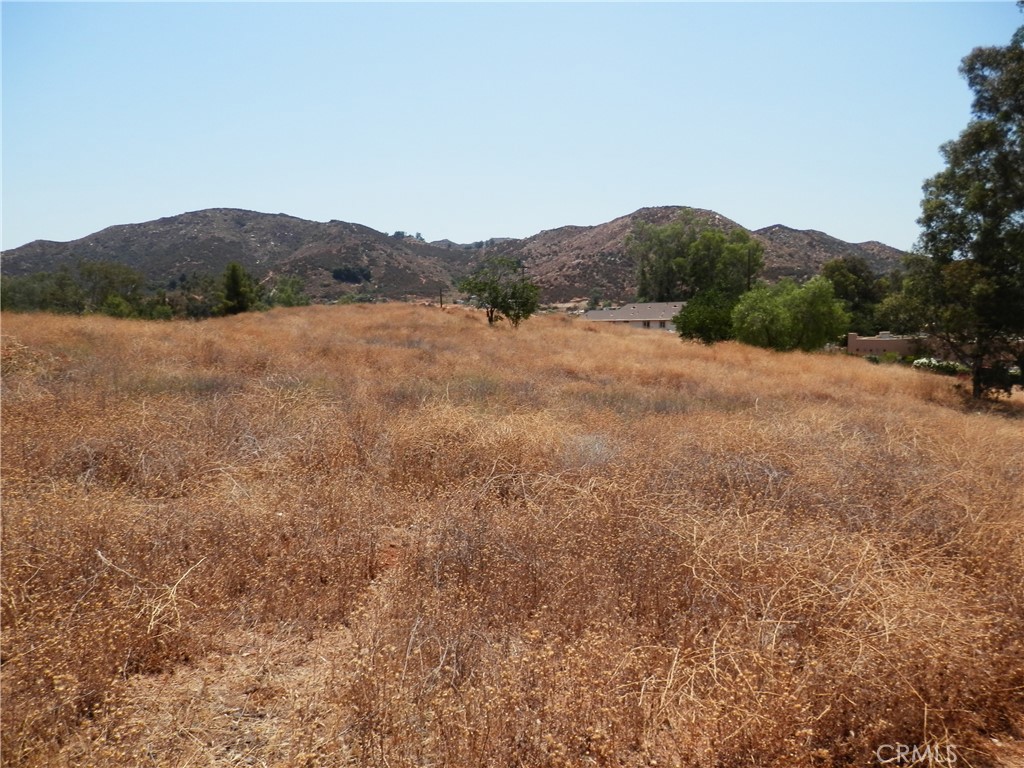 B Hemlock Street Wildomar, CA 92584 - Photo 3 of 17 a view of a large mountain with a mountain in the background