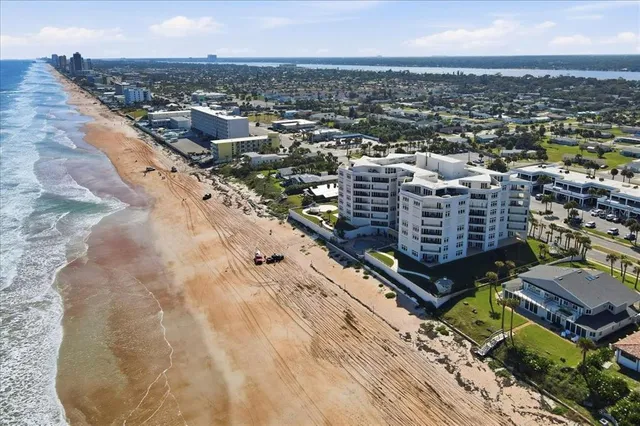a view of roof with city view