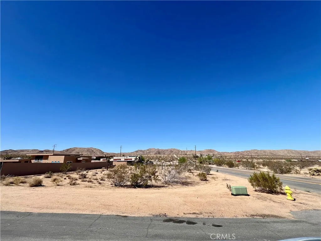 0 Division Street Joshua Tree, CA 92252 - Photo 8 of 10 a view of a building with a mountain view in back